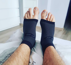 Foot wearing black FS6 Performance Foot Sleeve.