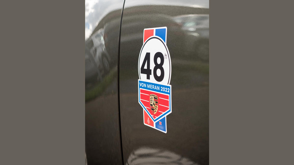 mounted sticker on door of porsche 911 - art by life