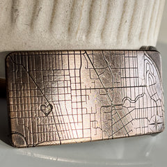 Seattle map engraved on custom bronze belt buckle