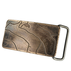 Custom engraved road map with house outlines on bronze belt buckle handmade in Seattle