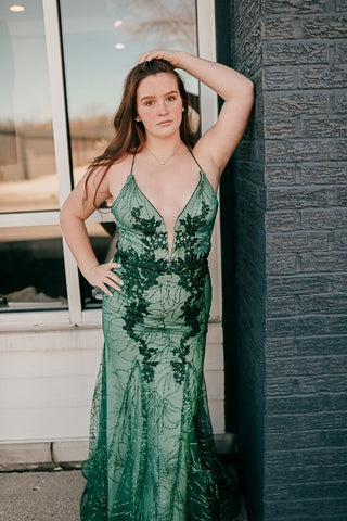 prom dress with a deep v and green lace