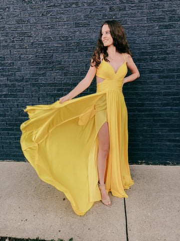 yellow prom dress with a slip and cut outs