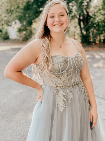 corset prom dress with silver and gold