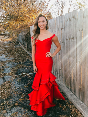 red off the shoulder prom dress with a ruffle mermaid skirt