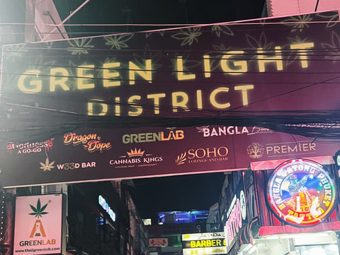 Banner in Patong, Phuket that reads Green Light District