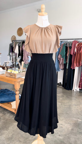 black maxi skirt with brown top