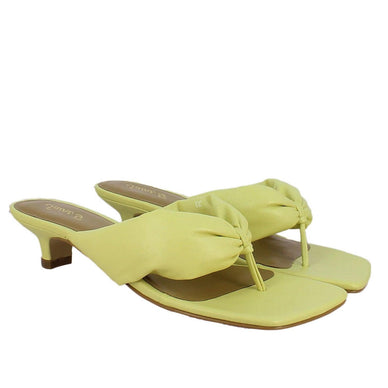 This low heel flip flop sandal is guaranteed to elevate all of your summer looks. The sandal features square toe and puffed leather straps. The sandal is complete with leather covered short heel, tunit sole and padded leather footbed for natural comfort and breathability. Ideal for any causally elegant occasion. 
Brand Name: Saint G 
 Color: Yellow Closure: Slip-on Upper: Leather Sole: Tunit Heel Height: 1.38 Inches 
Runs Narrow/Small. Consider buying a size up if you are between sizes. 
Fulfilled by our friends at FutureBrandsGroup 

*Please Note: 

Rewards cannot be applied to this product
This item is not eligible for returns 
This item cannot be shipped outside the U.S.
