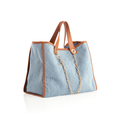 Carry all your essentials in style this summer with Shiraleah's Ali Tote bag. Made from sturdy denim fabric with PU handles and accents, this bag is perfect for everyday use. Its chain shoulder strap adds a touch of chicness and brings the runway to your closet. Pair with other items from Shiraleah to complete your look! 

Features double handles, a chain shoulder strap, magnetic snap closure, and 1 inner slip pocket
Shiraleah is a trend-driven lifestyle brand focused on the little gifts that make life special!
Made from cotton, polyester, rayon, spandex denim, and smooth pu with gold hardware
Measures L 19" x w 8.5" x h 12"; handles 8.5"; chain 11"
Made in China

Fulfilled by our friends at Shiraleah 
*Please Note: 

Rewards cannot be applied to this product
This item is not eligible for returns 
This item cannot be shipped outside the U.S.
