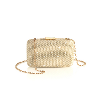 Add a touch of elegance to your summer accessories with Shiraleah's Lola Minaudiere. With a simple netted ivory background, the faux pearl details are the star of the show on this purse. You can carry it as a clutch, or use the detachable cross-body chain to add some versatility to your style. Pair with other items from Shiraleah to complete your look! 

Features a detachable cross-body chain and pick-lock closure
Shiraleah is a trend-driven lifestyle brand focused on the little gifts that make life special!
Made from polypropylene and faux pearls, with gold hardware
Measures L 7" x w 2" x h 4.25"; chain 23"
Made in China

Fulfilled by our friends at Shiraleah 
*Please Note: 

Rewards cannot be applied to this product
This item is not eligible for returns 
This item cannot be shipped outside the U.S.
