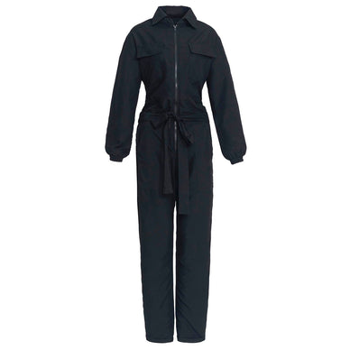 Our cool and casual Amelia Jumpsuit in black with its relaxed style is designed for the perfect traveling or outdoor occasion; whether it’s a date to an art exhibit or a rooftop brunch gathering with close friends. This precious piece was named after one of our forever muses, Amelia Earhart, the first female aviator to fly solo across the Atlantic ocean. Complete with a spread collar, tie waist, and front utility pockets, this chic jumpsuit offers a simple yet stylish look.  Pair with strappy heels and a small satchel for a classic and feminine vibe. 
DETAILS Composition: 100% GRS-certified recycled fabric. Featured with 2 spacious utility pockets 2 side pockets. Fabric waist belt. Stain-resistant recycled fabric. Elastic waist. Elastic sleeve cuffs. 
Fulfilled by our friends at BrunnaCo 
*Please Note: 

Rewards cannot be applied to this product
This item is not eligible for returns 
This item cannot be shipped outside the U.S.
