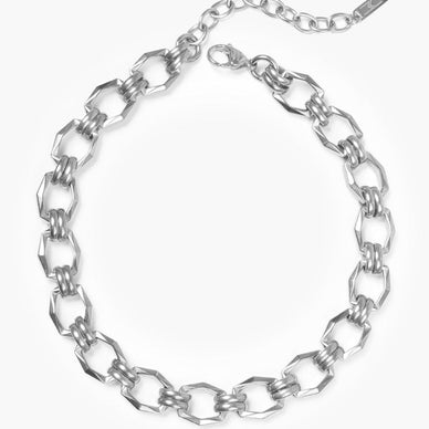 Edgy, unapologetically bold, and a little Rock and Roll — the Cyrus Choker always makes a statement, just like the woman who inspired it.  This substantial and intricate choker is comprised of fabulous faceted octagonal links, each chained together by two ovular rings.  Complete with an attached extender, this choker can be worn a myriad of lengths to go perfectly with every neckline in your wardrobe.  Stack this piece with a Gabriella Chain and Crown Choker for a maximalist layered neck party — or rock a silver *and* gold Cyrus Choker together for the ultimate mixed-metal ensemble.  #WhatWouldMileyDo 

Lobster clasp closure
13" length + 2.5" extender

Fulfilled by our friends at Marrin Costello 

*Please Note: 

This item is not eligible for returns 
This item cannot be shipped outside the U.S.
