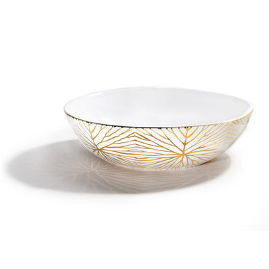 Our Lily Pad low serving bowl is inspired by the organic branching of the Giant Lily Pad, a surprisingly delicate, yet strong, plant found in the Amazon. Designed to bring celebration to your dining table, it serves roasted vegetables, pastas and even fish with ease. Host, beautify, and thrive at home with this stunning bowl, patterned in 24K gold.
 
Fulfilled by our friends at ANNA NEW YORK 
*Please Note: This product cannot be shipped outside of the U.S. 
