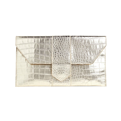 Carry this metallic mock-croc clutch to all your celebrations this season and give any look a glamorous upgrade. 

Color: Platinum Croc
Fabric: Vegan Leather
Dimensions: 6.75 in H X 12.25 in W X 1 in D
