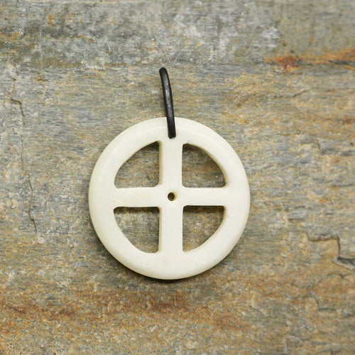 Bone Sun Cross Odin Pendant on Rock