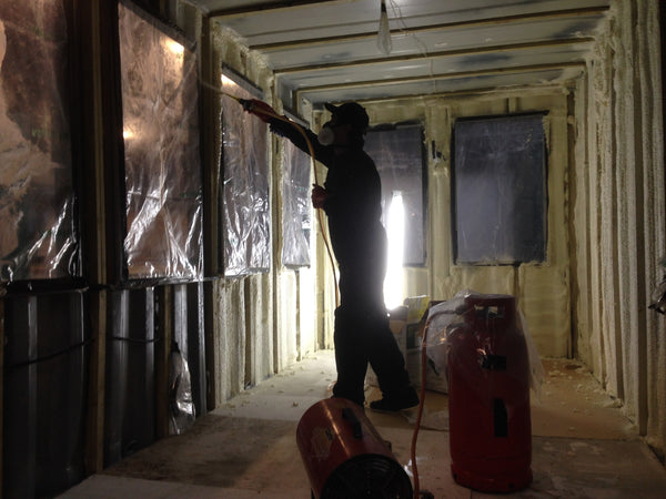 Applying the two part foam insulation