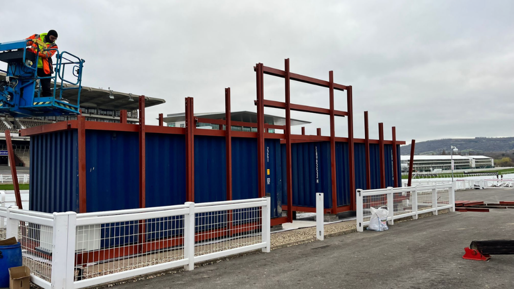 Attaching a steel frame to a shipping container