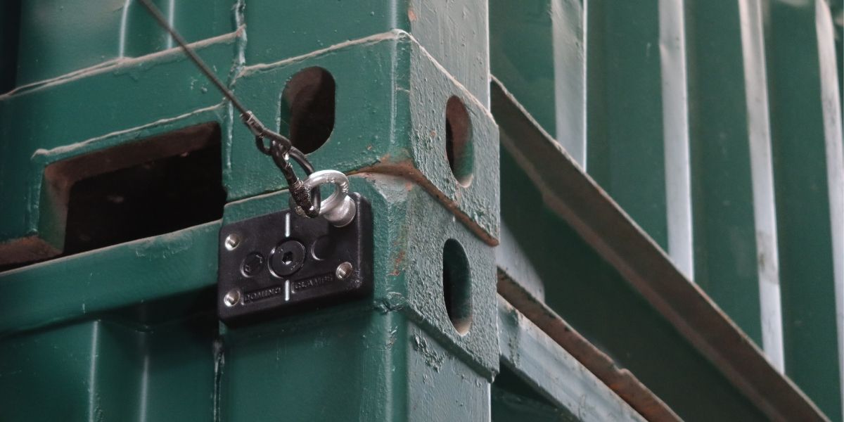 Eyebolt with wire attached to a shipping container