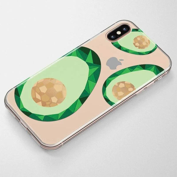 A phone with a rose gold clear case and avocados printed on it