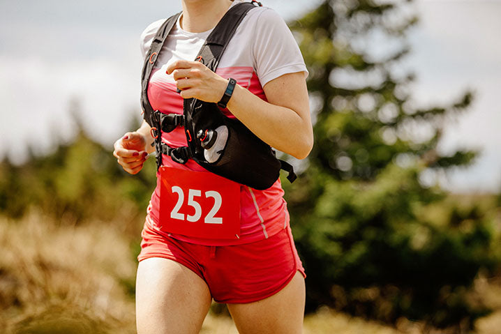 runner wearing camelback hydration pack