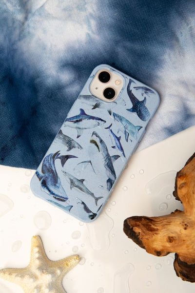 blue iphone case with sharks on it