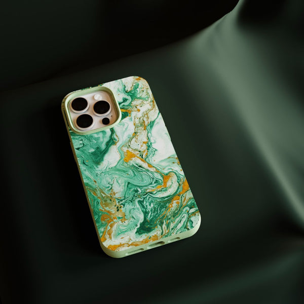 A green marble phone case on a black fabric background