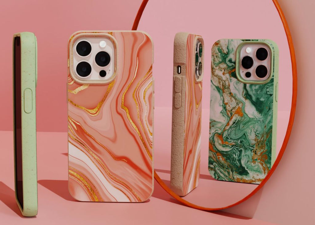 Various colored marble phone cases laying on a table