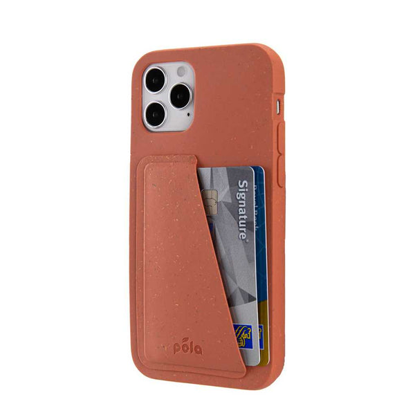 A brownish-red phone case with a wallet attachment on the back