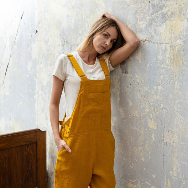 Blonde woman wearing yellow organic linen jumpsuit