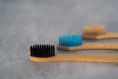 three different toothbrushes