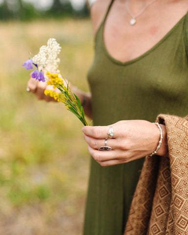 Woman holding wildflowers