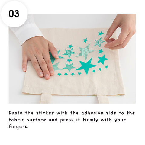 Paste the Irodo sticker with the adhesive side to the fabric surface and press it firmly with your fingers.