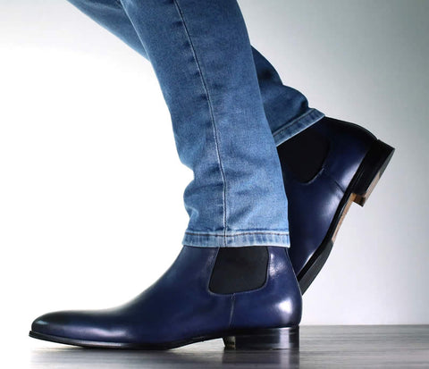 Blue chelsea boots with light blue jeans