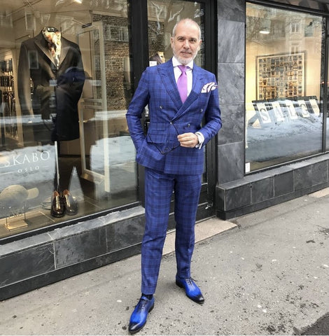 Blue wholecut oxford shoes with blue suit