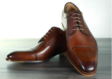 tan brown cap toe derby shoes