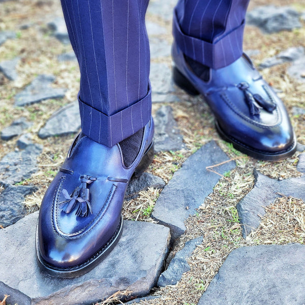 Blue loafers with a navy blue suit