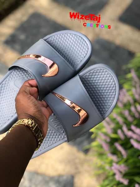 gold check nike slides