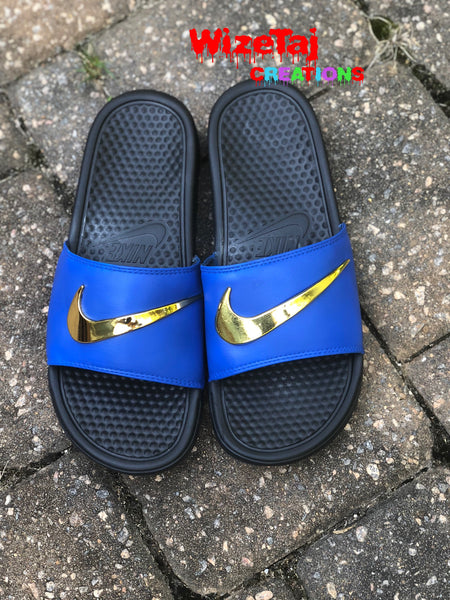 blue nike slides with gold check