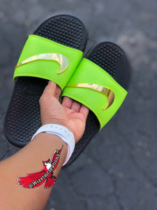 maroon nike slides with gold check