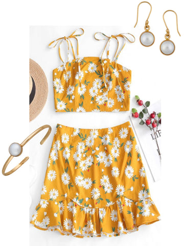 Sunflower shirt and skirt combo with a pearl cuff and earrings