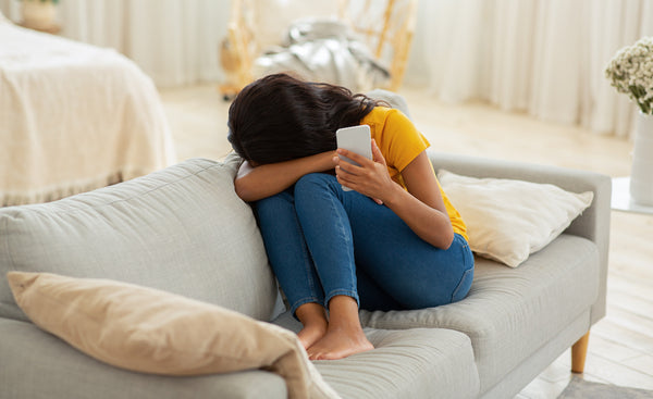 Woman Sad on Phone