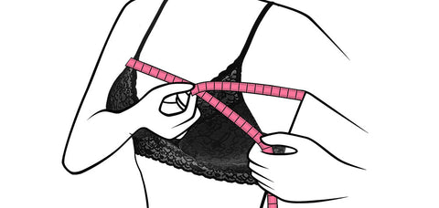 Sketch of female silhouette measuring just below the underarms with pink measuring tape.