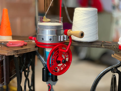 We use a hand-cranked machine to knit the Swizzle Socks
