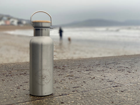 Buy a reusable bottle to help cut down on using plastic.