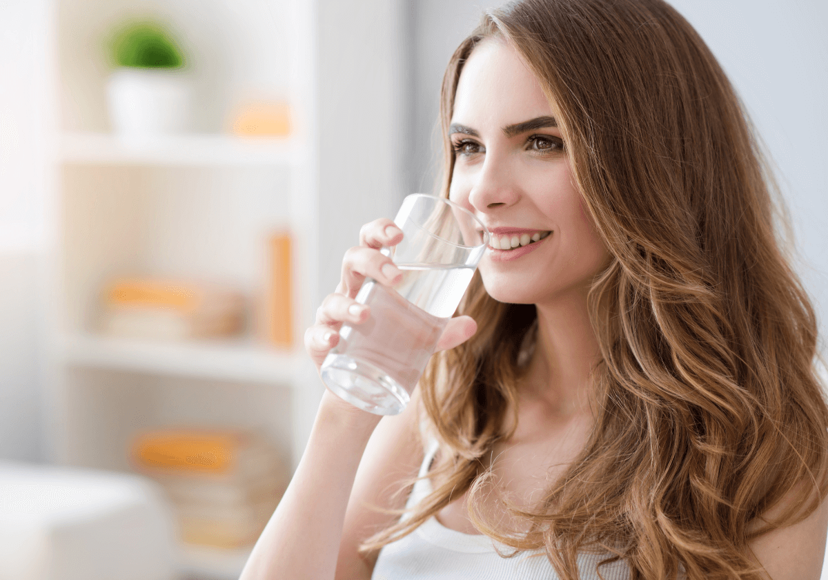 a woman drinking water