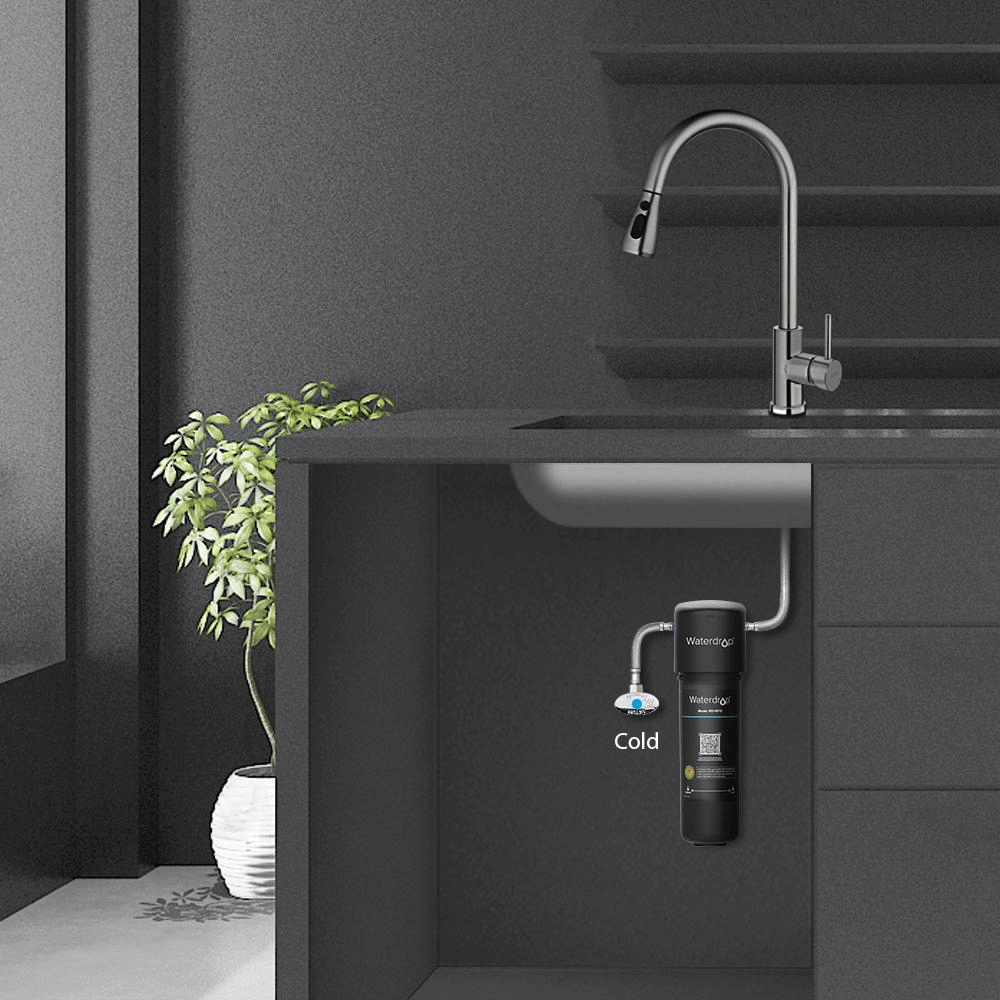 The undersink scene with a water filtration system installed