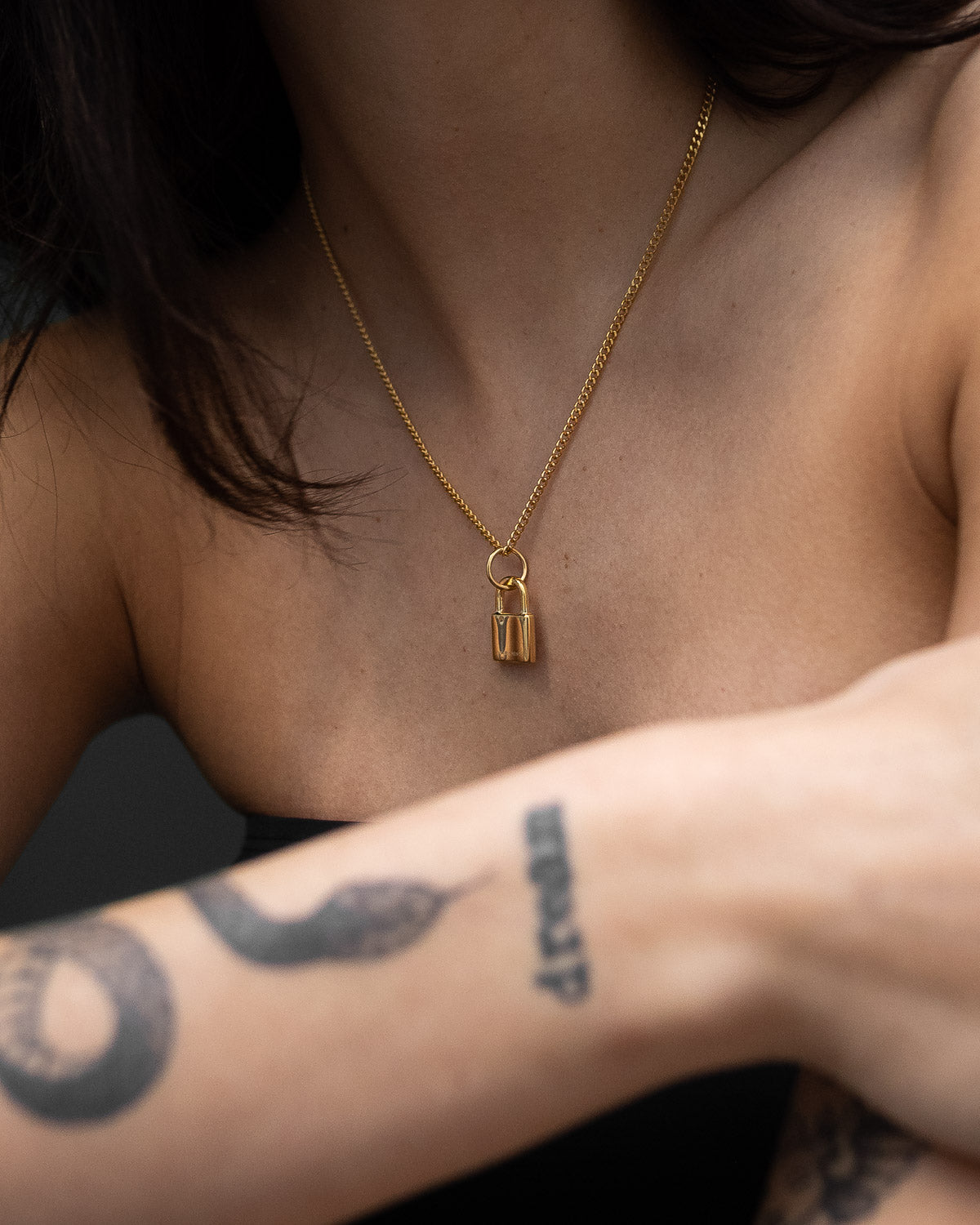gold padlock pendant by statement collective