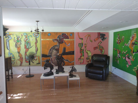 A photo of large abstract oil on canvas paintings on the walls of James Bruch's home.