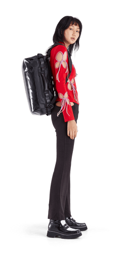 model sporting the Go-Bag — Mini in the color Black