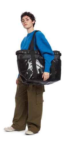 model sporting the Go-Tote Mega in the color Black