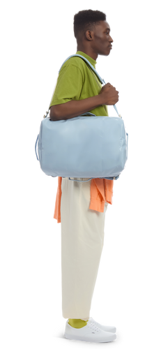 model sporting the Go-Bag — Mini in the color Drizzle
